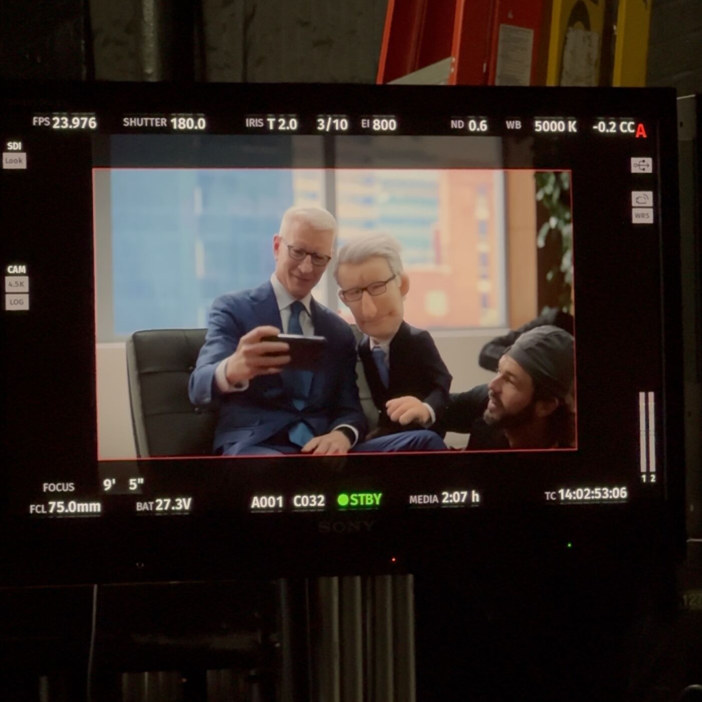 Camera monitor showing CNN anchor Anderson Cooper beside his look-alike puppet built by Furry Puppet Studio